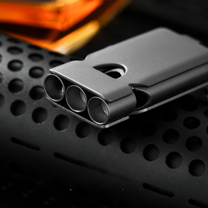 High-decibel outdoor emergency whistle made of titanium alloy