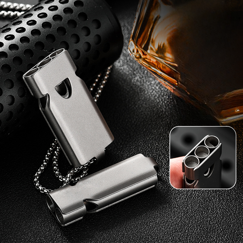 High-decibel outdoor emergency whistle made of titanium alloy